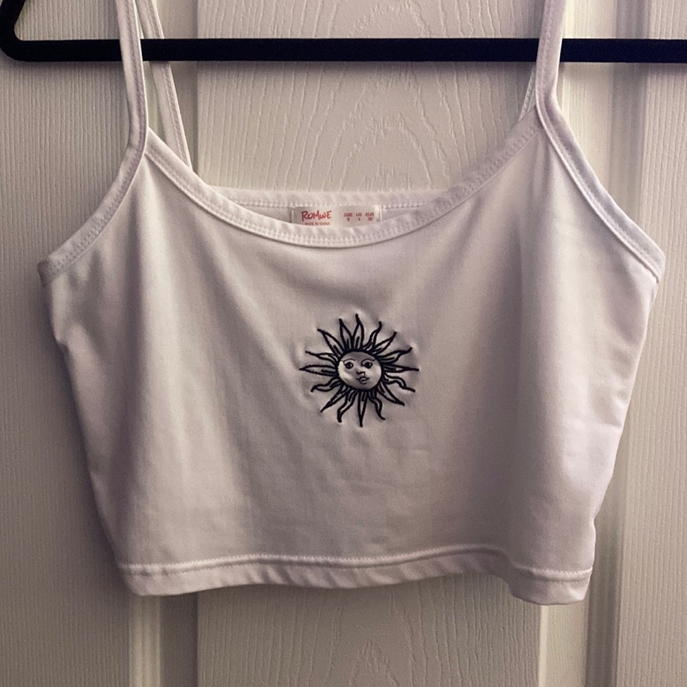 White tank top with the sun on it